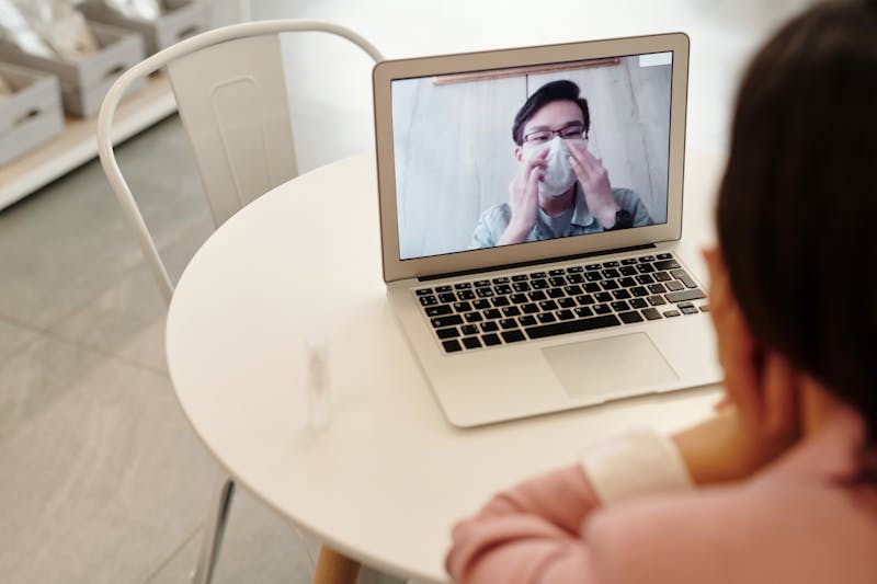 Doctor on video call — telehealth skin evaluation