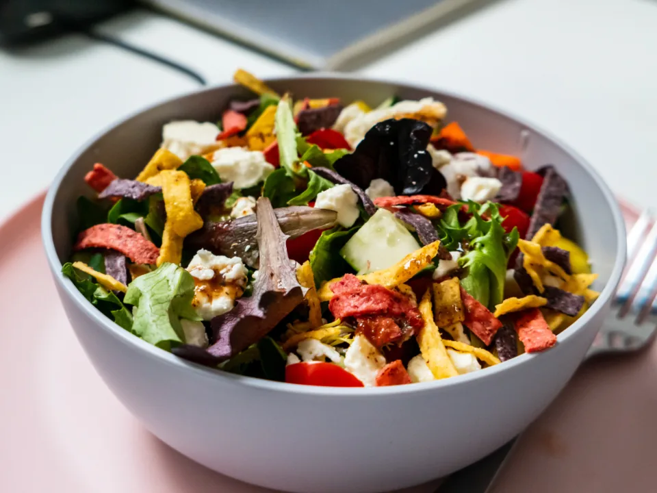 Fresh salad bowl representing GERD-friendly dietary changes