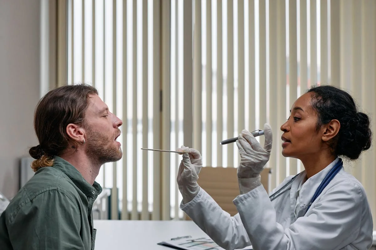 Doctor examining patient during medical consultation