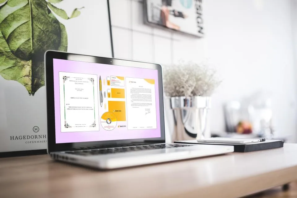 A laptop on a desk displaying a document, representing requesting a doctor's note online
