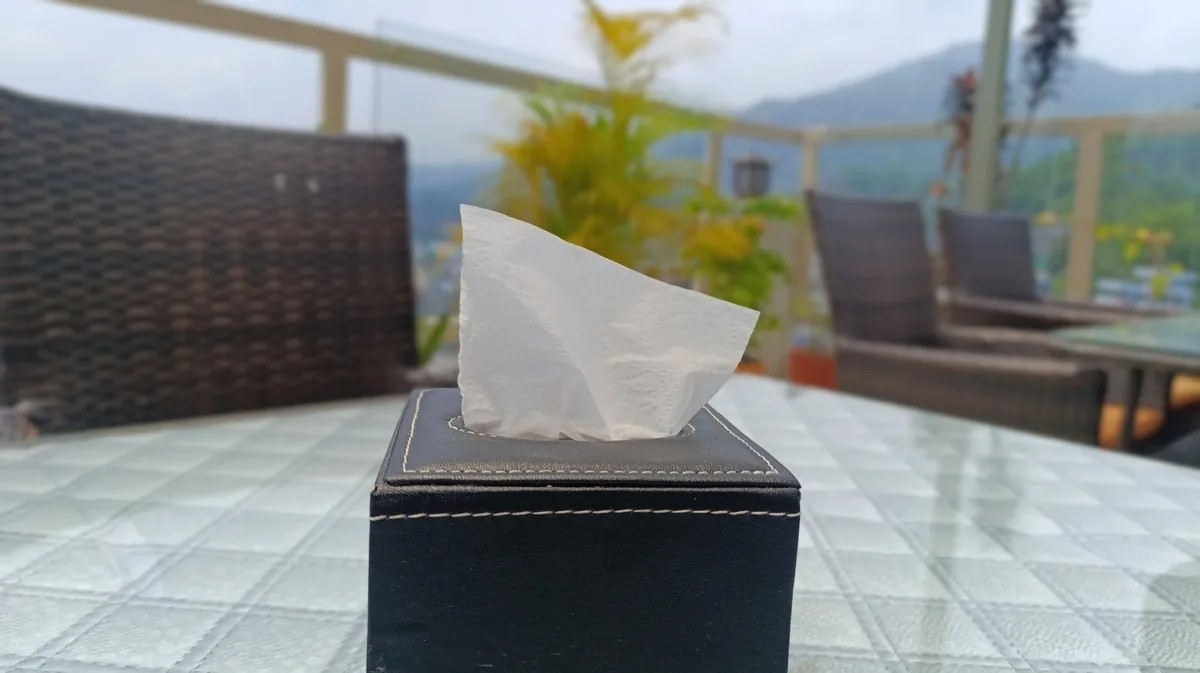 Box of facial tissues on a table for managing a nosebleed