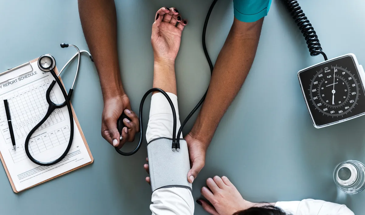 A blood pressure cuff and gauge used to check blood pressure