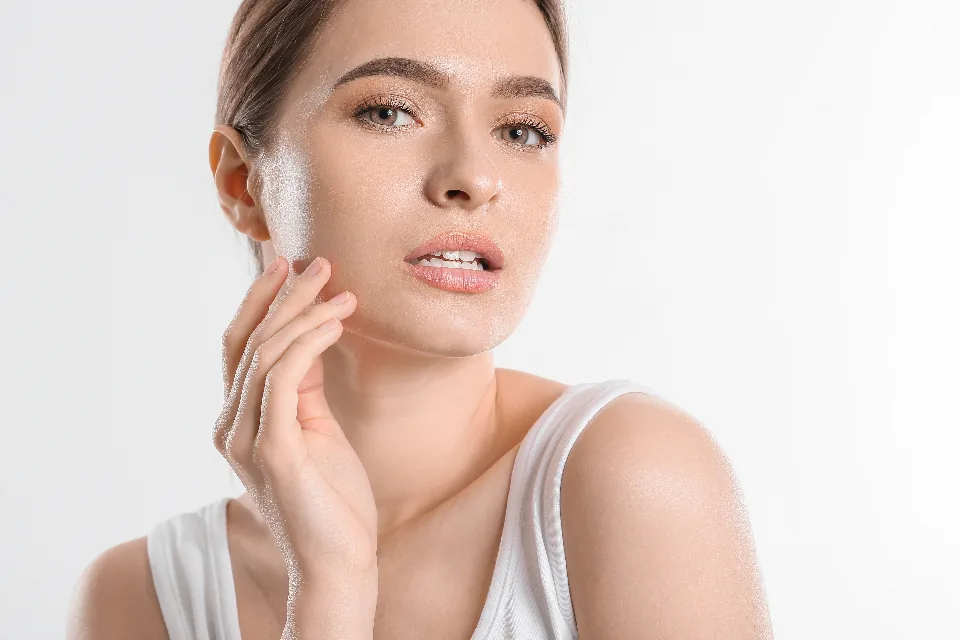 Close-up of a person's clear, healthy facial skin during a skin-care routine