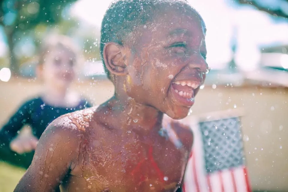 A happy, healthy child playing outdoors
