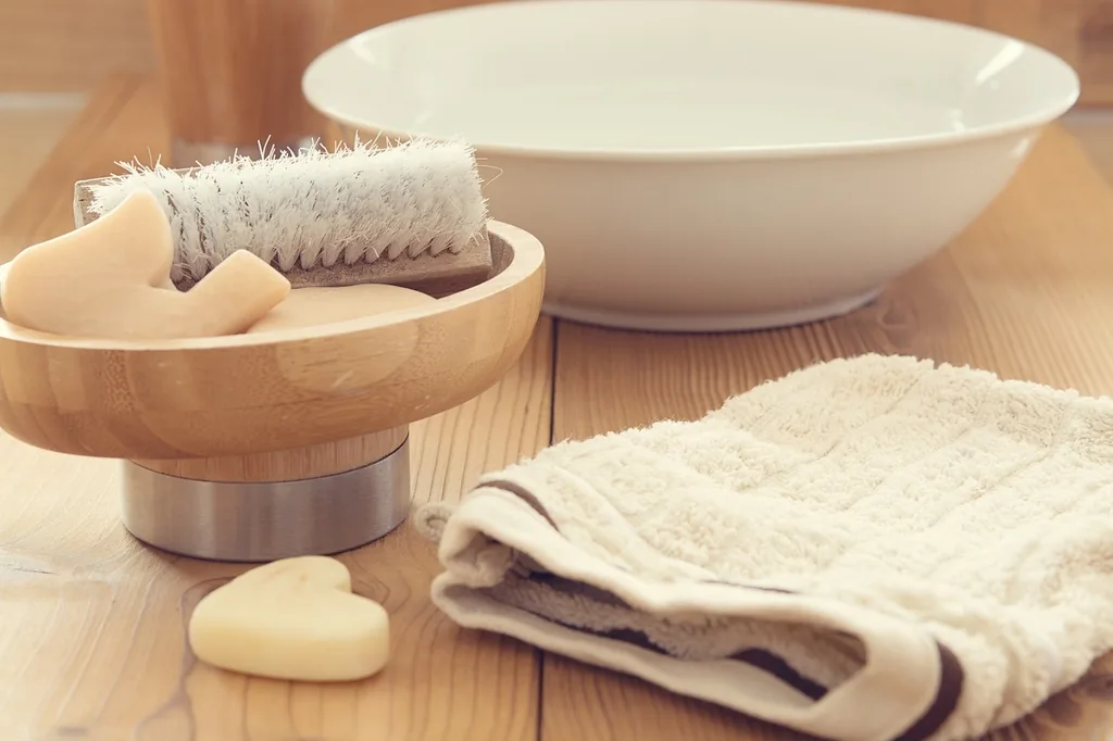 Folded cloth and a bowl of water for a warm compress, a home treatment for pink eye