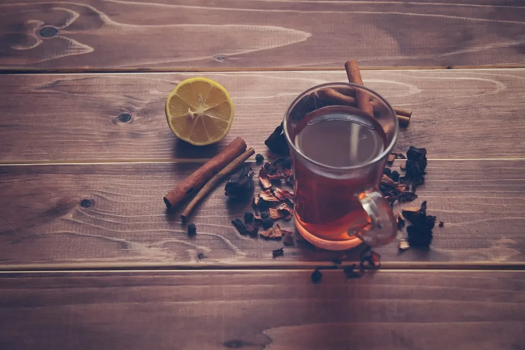 Warm cup of spiced tea with lemon, supporting rest and recovery from walking pneumonia